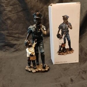 Vintage Police Officer with Child Sculpture